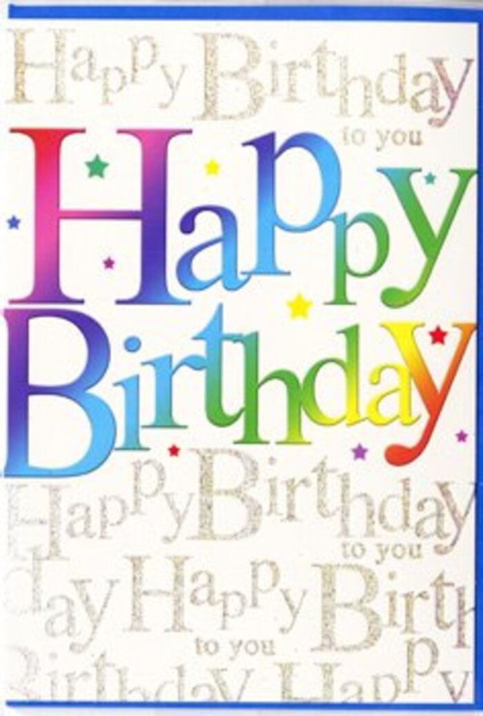 In the photograph, a striking birthday card stands as the focal point, its front decorated with a lively mix of rainbow colours and glittering gold that feels perfectly at home in the cheerful streets around Wimbledon station. The words Happy Birthday are displayed prominently across the centre in large, smooth-edged letters, each one filled with a different hue. The colours sweep across the phrase in a harmonious gradient: bold reds against blush pinks, sliding into mandarin orange and honey yellow, then drifting into soft lime, bright grass green, teal, cerulean blue, indigo, and finally a soft violet. There are no hard divisions between shades; instead, they melt gently into one another, giving the impression of light passing through stained glass or petals blending in a well-composed bouquet. Behind this vibrant lettering lies a backdrop of intricate, looping script in metallic gold. The background text repeats Happy Birthday to you in flowing cursive, with each stroke dusted in glitter-like shimmer. As the light touches the surface, the gold script appears to flicker, like reflections on shop windows along Wimbledon Broadway at dusk. Delicate sparkles scattered throughout the background add to the sense of movement and joy, mimicking the effect of tiny confetti pieces sprinkled behind the bold greeting. The card appears to be printed on a smooth, slightly lustrous board, giving it a polished, tactile appeal. Altogether, the design feels both jubilant and thoughtfully crafted-a card that doesn't just wish someone a happy birthday, but visually celebrates them. It's easy to picture this card tucked alongside a hand-tied bouquet being delivered across Wimbledon, its rainbow message complementing every stem and capturing the spirit of a day filled with laughter and warm wishes.